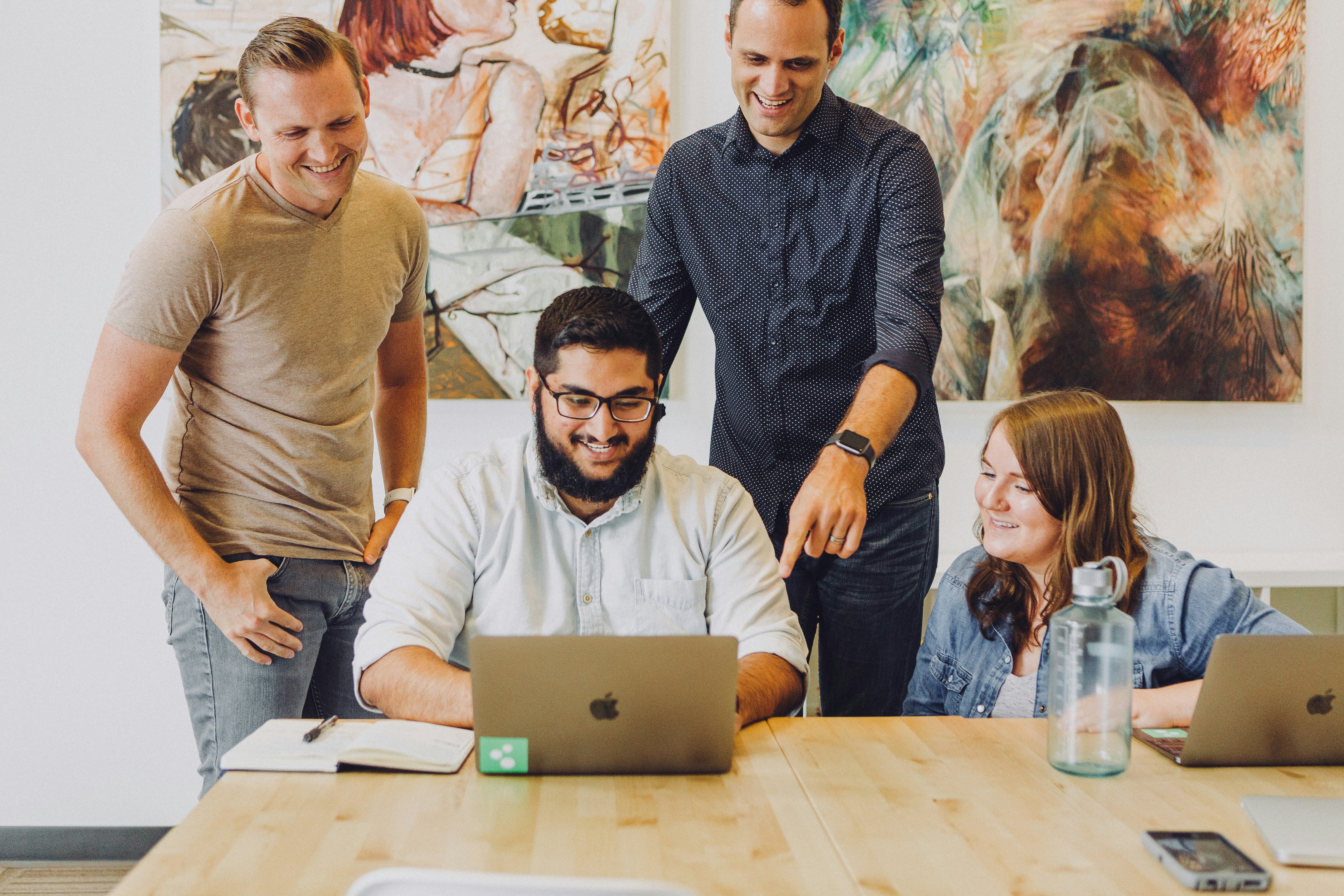 people around a computer