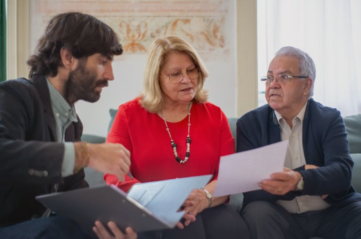 people around a desk